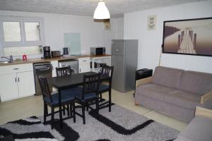 Appartements Au pied du donjon : photos des chambres