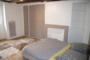 Appartements Au pied du donjon : photos des chambres