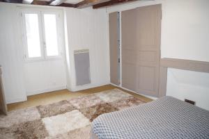 Appartements Au pied du donjon : photos des chambres