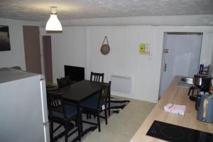 Appartements Au pied du donjon : photos des chambres