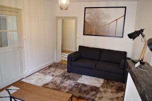 Appartements Au pied du donjon : photos des chambres