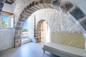 Apostrophe Traditional Residence in Nisyros with arcurated interior. Privacy & Authenticity