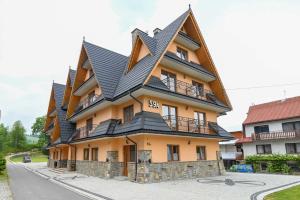 Pod Tatrami 2 - duży parking, świetna lokalizacja przy wyciągu narciarskim - obok restauracji