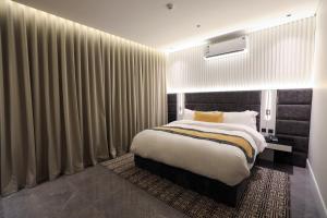 أجنحة توباز الملقا