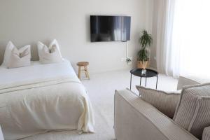 Appartements L'Elegance - climatise - GO IMO : photos des chambres