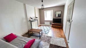 Appartements Au pied du donjon : photos des chambres