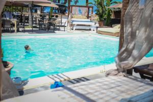 Appartements Porticcio Vacations - Terrasse, Piscine, Jacuzzi, Clim - by TGB : photos des chambres