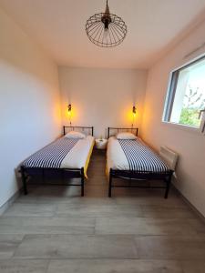 Maisons de vacances Les Loguyviennes : photos des chambres