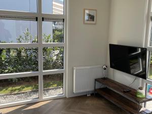 Modern chalet with a dishwasher in Lathum