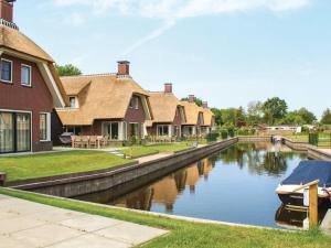 Villa in Friesland with Waterfront Jetty