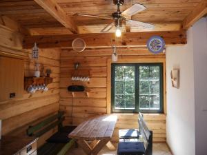 Wooden Cottage in Czarny Mlyn with garden and barbecue