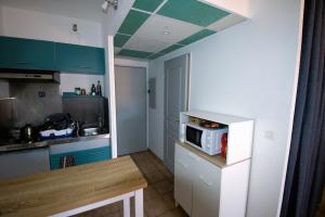 Appartements Studio Albatros en RDJ avec Terrasse, Parking prive, Piscine, proche Golf St Donat : photos des chambres