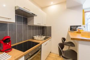 Appartements Le Champenois - Appt en centre-ville : photos des chambres