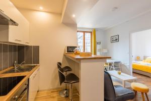 Appartements Le Champenois - Appt en centre-ville : photos des chambres