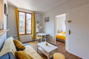 Appartements Le Champenois - Appt en centre-ville : photos des chambres