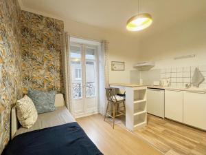 Appartements Cosy Coin - proche Gare et Jardin des plantes : photos des chambres