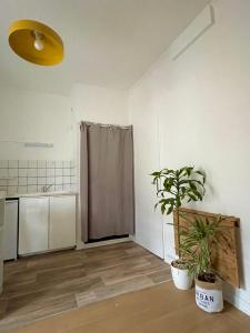 Appartements Cosy Coin - proche Gare et Jardin des plantes : photos des chambres