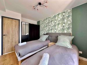 Appartements Le Nid Douillet Cherbourgeois : photos des chambres