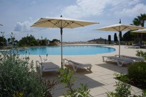 Villas Villa Domaine du golf de Roquebrune : photos des chambres