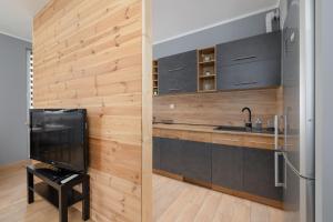 Osiedle Avia Family Apartment in Kraków with Balcony by Noclegi Renters