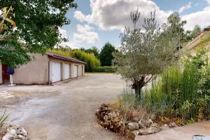 Maisons de vacances Charmante maison avec parc arbore & piscine au sel : photos des chambres