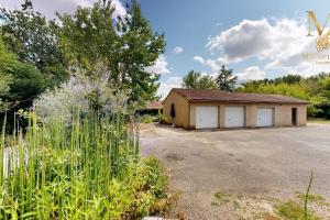 Maisons de vacances Charmante maison avec parc arbore & piscine au sel : photos des chambres