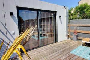 Maisons de vacances Maison type loft avec terrasses : photos des chambres