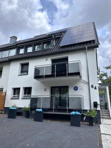 FeWo by HD mit Parkplatz, Wallbox, Wintergarten