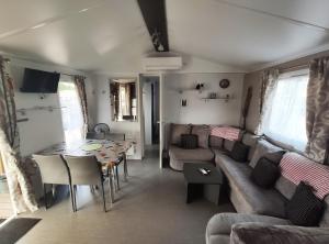 Campings Mobil home Climatise Spacieux 3 chambres 2 sdb : photos des chambres