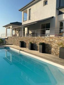 Villas Villa de charme a louer en Corse, piscine chauffee : photos des chambres