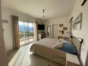 Villas Villa de charme a louer en Corse, piscine chauffee : photos des chambres