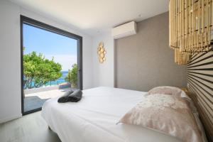 Appartements Proche Monaco, vue mer, acces plage et jardin privatif : photos des chambres