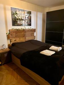 Appartements Apt central & cosy - a 15min de Paris & La Defense : photos des chambres