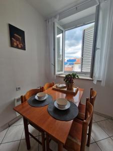 Apartma Roman