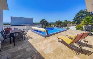 Maisons de vacances Beautiful Home In Portiragnes With Wifi, Swimming Pool And 4 Bedrooms : photos des chambres