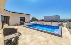 Maisons de vacances Beautiful Home In Portiragnes With Wifi, Swimming Pool And 4 Bedrooms : Maison de Vacances 4 Chambres