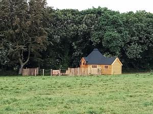 Tentes de luxe Cabane tout confort au calme : photos des chambres