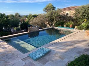 Appartements Petite maison avec terrasse et piscine : photos des chambres