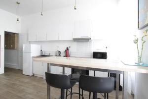 Appartements Le Quasi - 100% conforme & pro. : photos des chambres