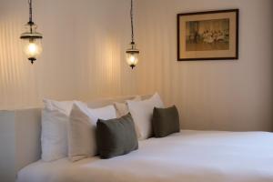 Hotels L'Abbaye Hotel : photos des chambres