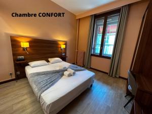 Hotels Hotel Terminus - Pizzeria Pizz'a gogo - salle de sport - face a la gare : photos des chambres