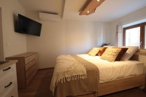Maisons de vacances Gite de charme avec jacuzzi et sauna privatifs : photos des chambres