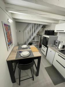 Appartements Au pigeonnier : hyper centre + Clim + parking gratuit : photos des chambres