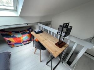 Appartements Au pigeonnier : hyper centre + Clim + parking gratuit : photos des chambres