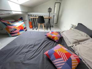 Appartements Au pigeonnier : hyper centre + Clim + parking gratuit : photos des chambres