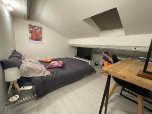 Appartements Au pigeonnier : hyper centre + Clim + parking gratuit : photos des chambres