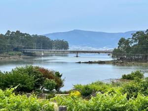 ÁTICO BOJ - Terraza con jardín & Hórreo Chill con vistas al mar
