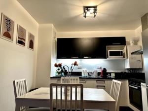 Appartements Appartement Cozy - Quartier residentiel : photos des chambres