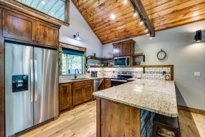 Big Cedar Vacation Rental with Deck and Hot Tub!