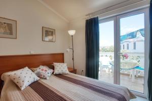 One-Bedroom Apartment with Balcony room in Apartments by the sea Brodarica Sibenik - 15270